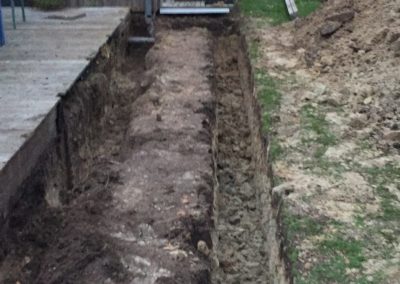 Uitgraven grond voor fundering Pergola